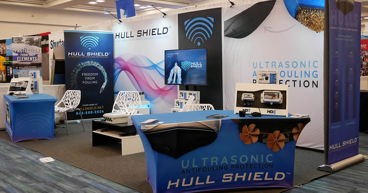 Image of Hull Shield's booth. Learn how ultrasonic antifouling can save your bottom paint.
